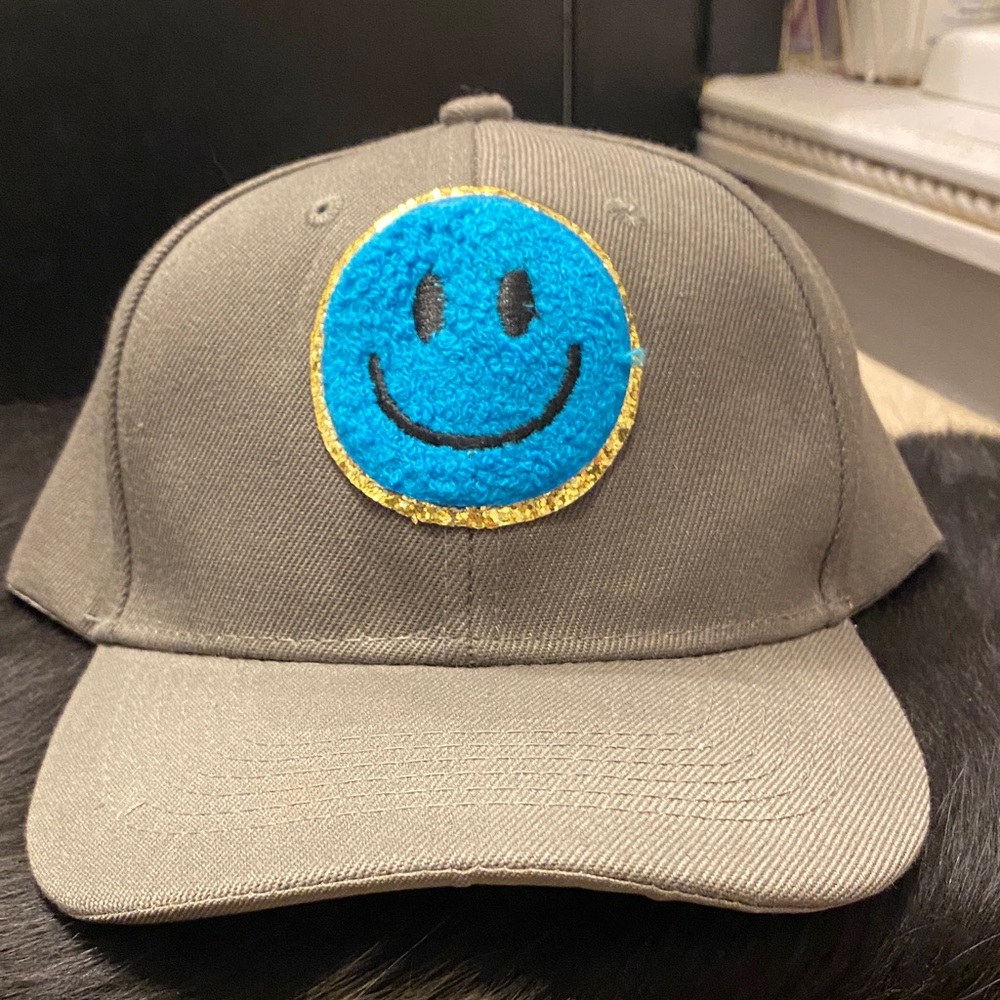 Gray Baseball Cap with Blue Smiley Face